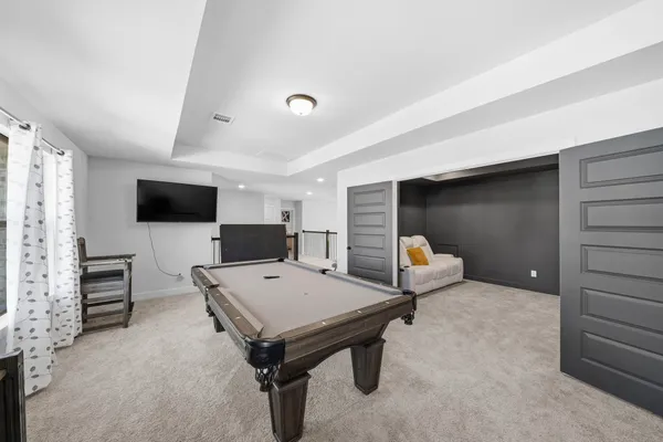 a living room with a couch and a couch