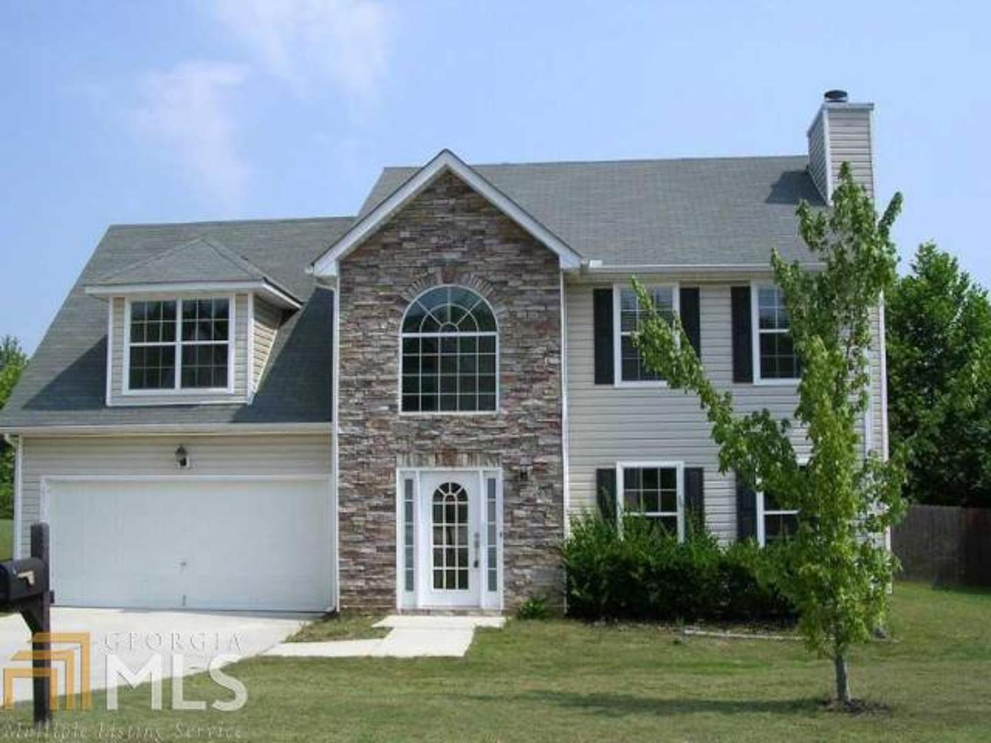287 Randy Way Dallas, GA 30132 - Photo 1 of 1 a front view of a house with a yard