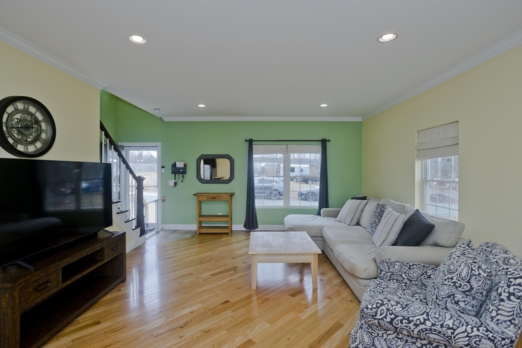 48 Mountain Avenue West Springfield, MA 01089 - Photo 6 of 39 a living room with furniture and a flat screen tv