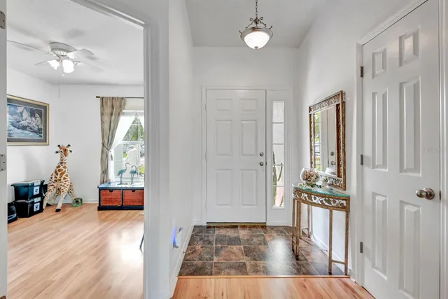 a view hallway with furniture and window