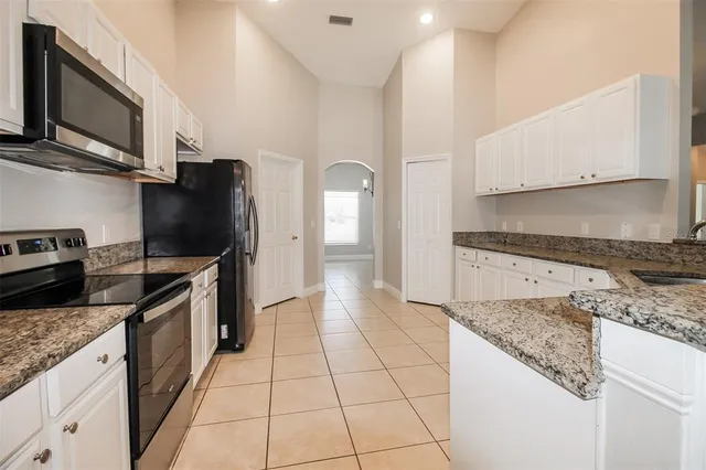 a view of a room that has a window in it