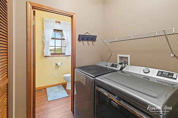 a utility room with dryer and washer