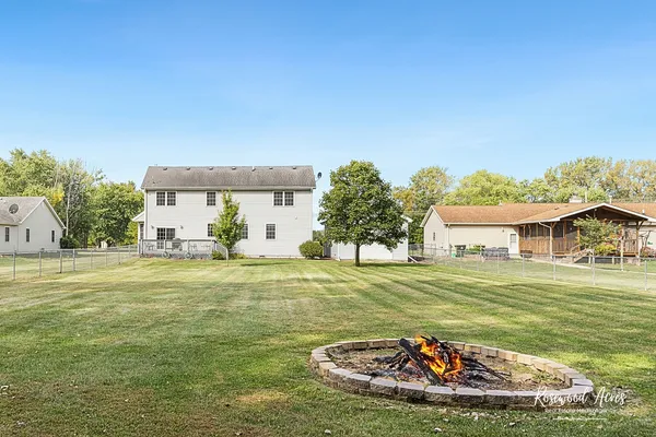 a view of a house with a big yard