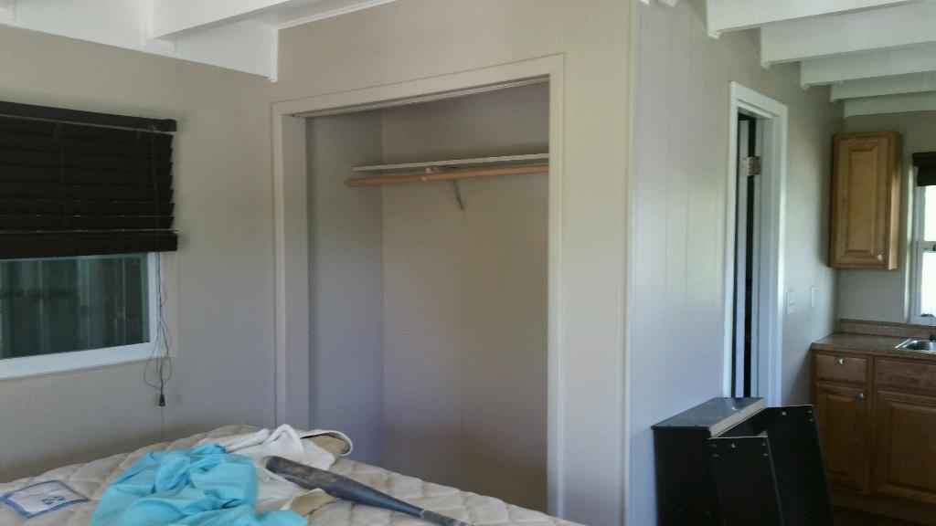 1703 Johnson Street, Unit B Key West, FL 33040 - Photo 4 of 10 a room with a bed and furniture