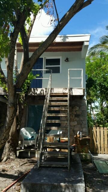 1703 Johnson Street, Unit B Key West, FL 33040 - Photo 5 of 10 a view of a house with a yard
