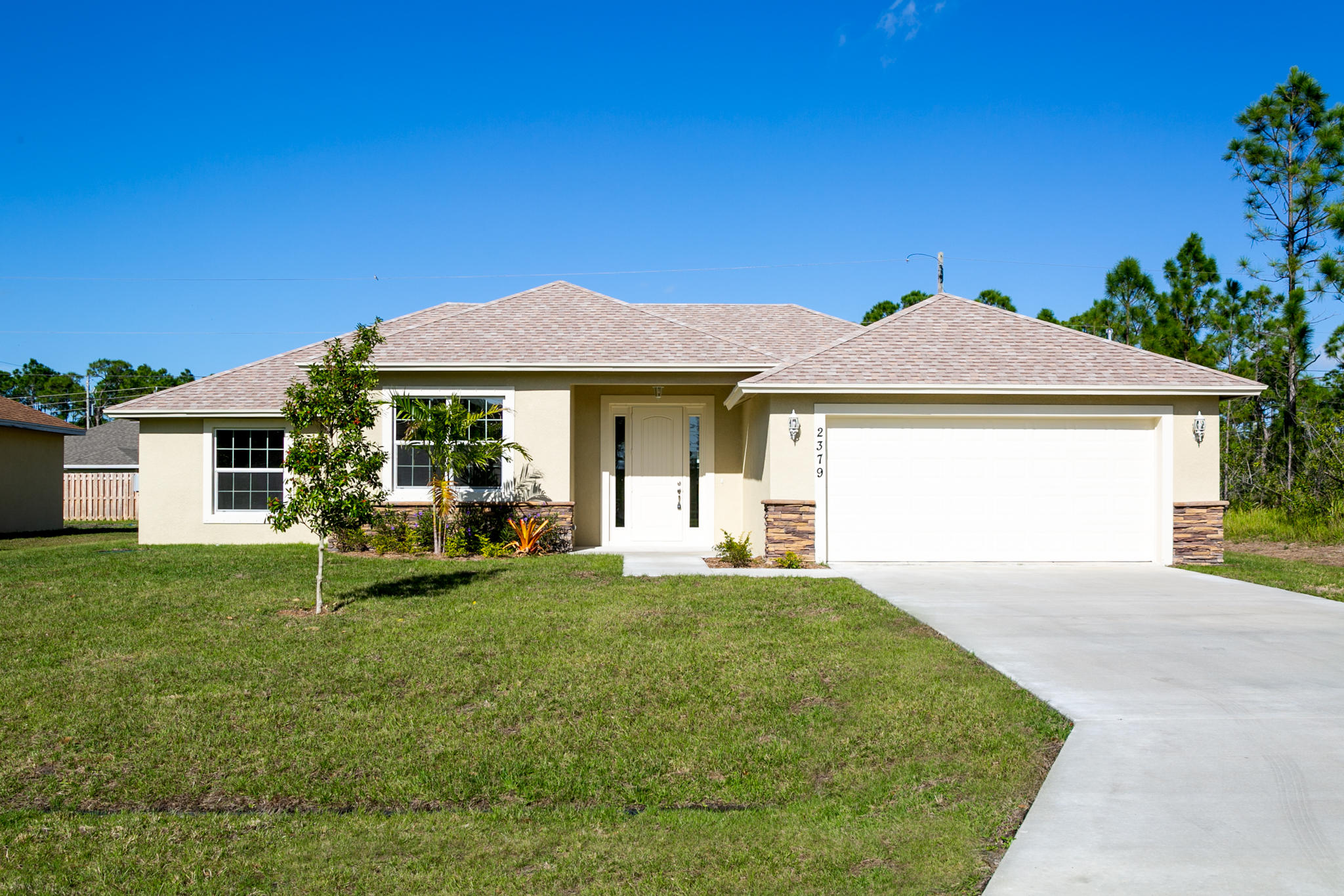 2379 Southwest Salmon Road Port St. Lucie, FL 34953 - Photo 1 of 29 EXTERIOR FRONT