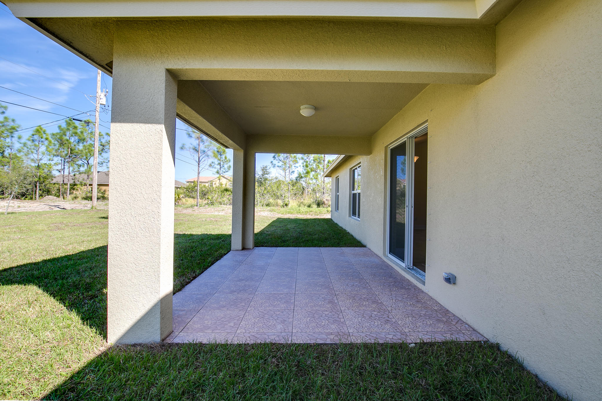 2379 Southwest Salmon Road Port St. Lucie, FL 34953 - Photo 27 of 29 COVERED PATIO