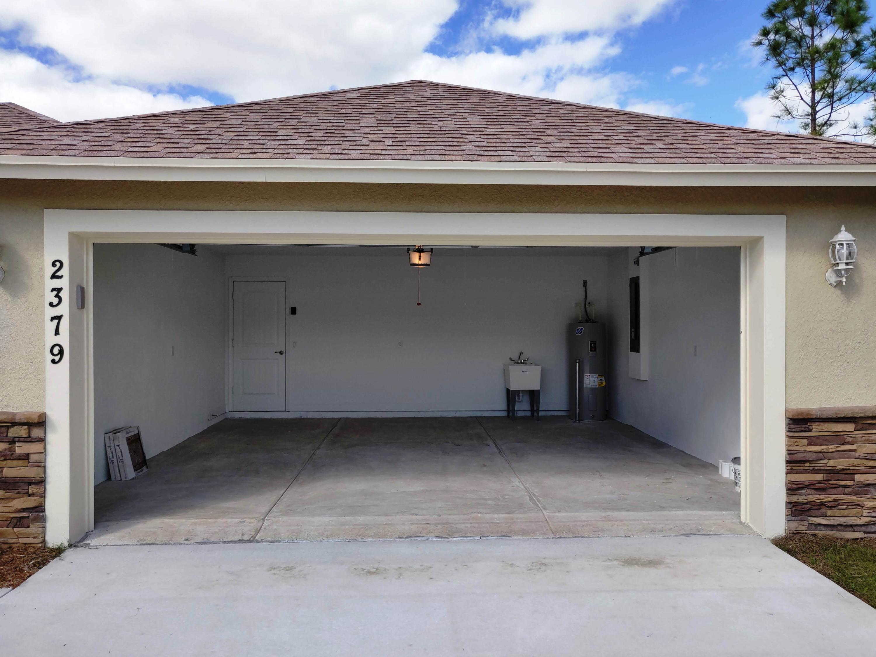2379 Southwest Salmon Road Port St. Lucie, FL 34953 - Photo 28 of 29 GARAGE
