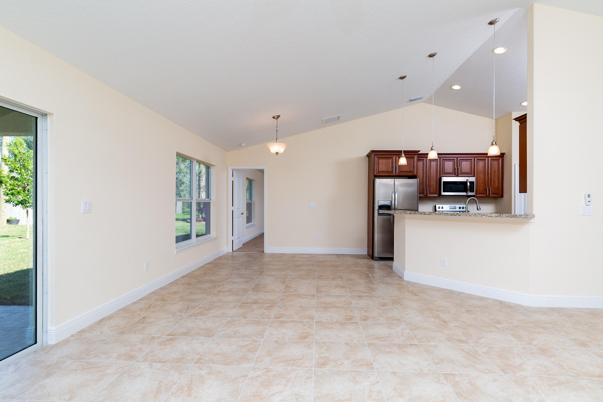 2379 Southwest Salmon Road Port St. Lucie, FL 34953 - Photo 7 of 29 LIVING ROOM/DINING AREA