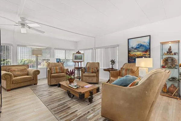 a living room with furniture and a couch