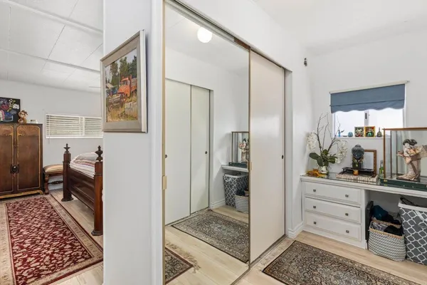 a bathroom with a glass shower door