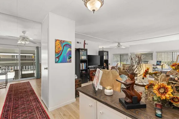 a living room with granite countertop furniture and a fireplace