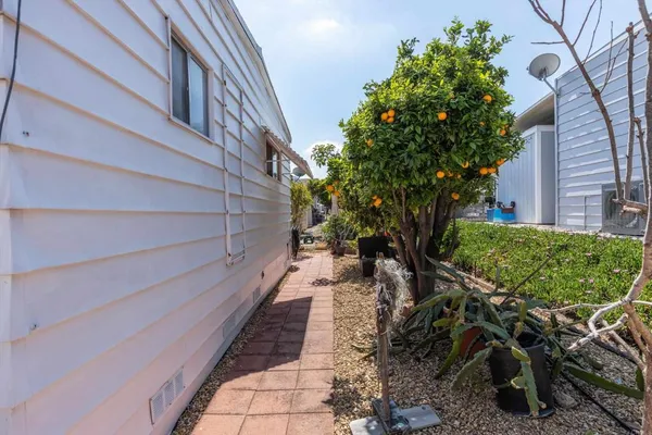 a view of a door and wooden floor