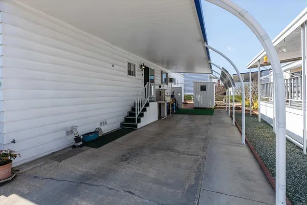 a front view of a house having a yard