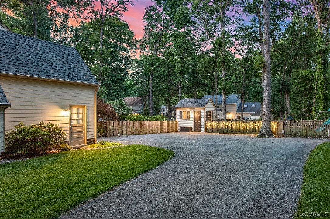 2301 Winterfield Road Midlothian, VA 23113 - Photo 14 of 50 a view of a backyard with sitting area and garden