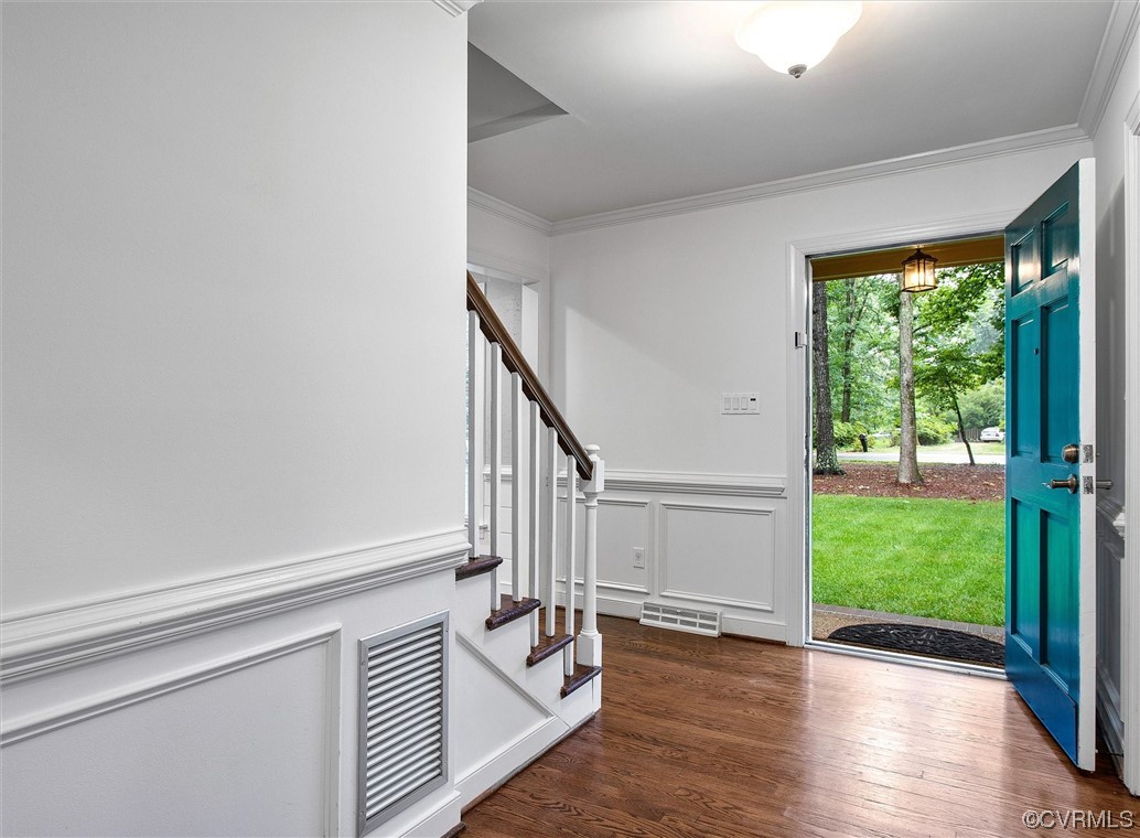 2301 Winterfield Road Midlothian, VA 23113 - Photo 17 of 50 a view of entryway with wooden floor and stairs