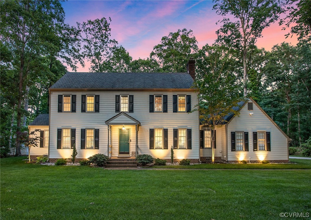 2301 Winterfield Road Midlothian, VA 23113 - Photo 2 of 50 a front view of a house with a garden