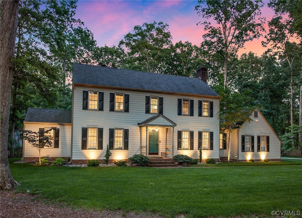 2301 Winterfield Road Midlothian, VA 23113 - Photo 3 of 50 a front view of a house with a garden