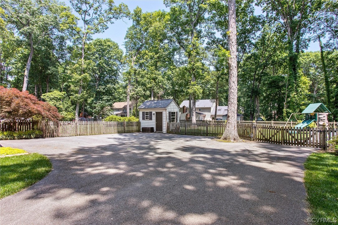 2301 Winterfield Road Midlothian, VA 23113 - Photo 43 of 50 a view of a house with a garden