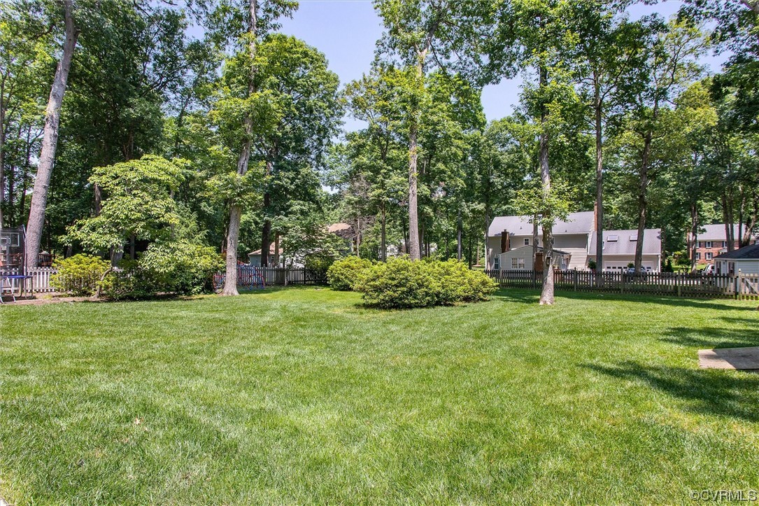 2301 Winterfield Road Midlothian, VA 23113 - Photo 45 of 50 a view of a house with a backyard