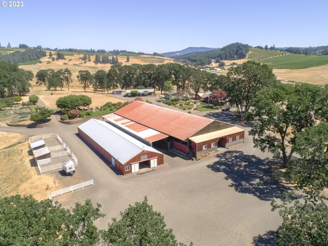 an aerial view of residential houses and city street