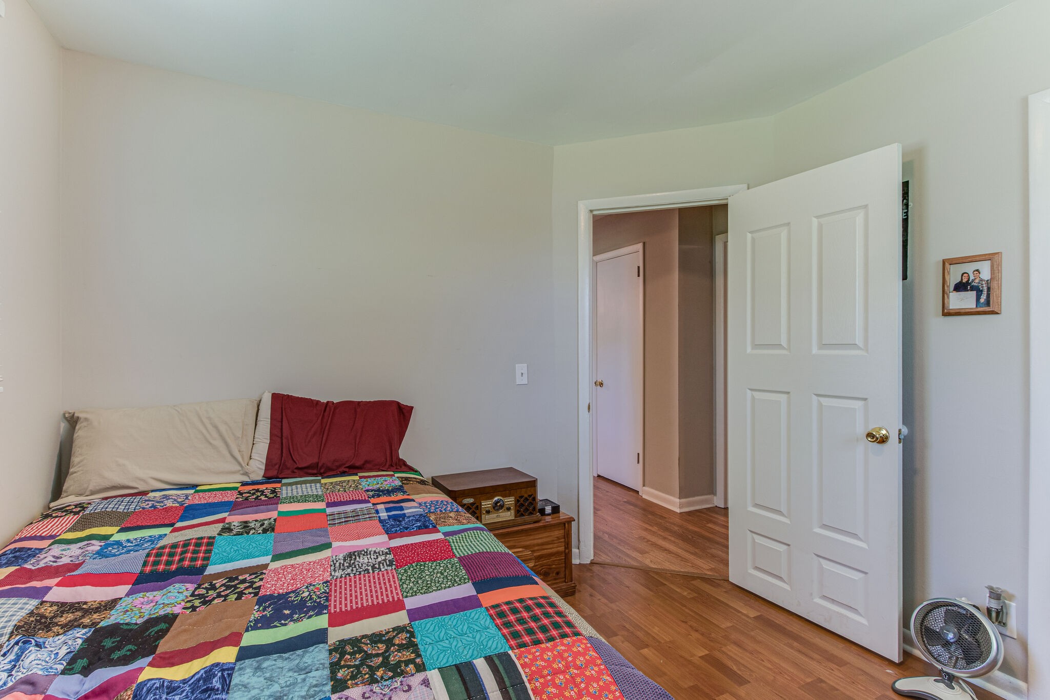 2234 South Ranch Road Murfreesboro, TN 37129 - Photo 21 of 29 a bedroom with a bed and wooden floor