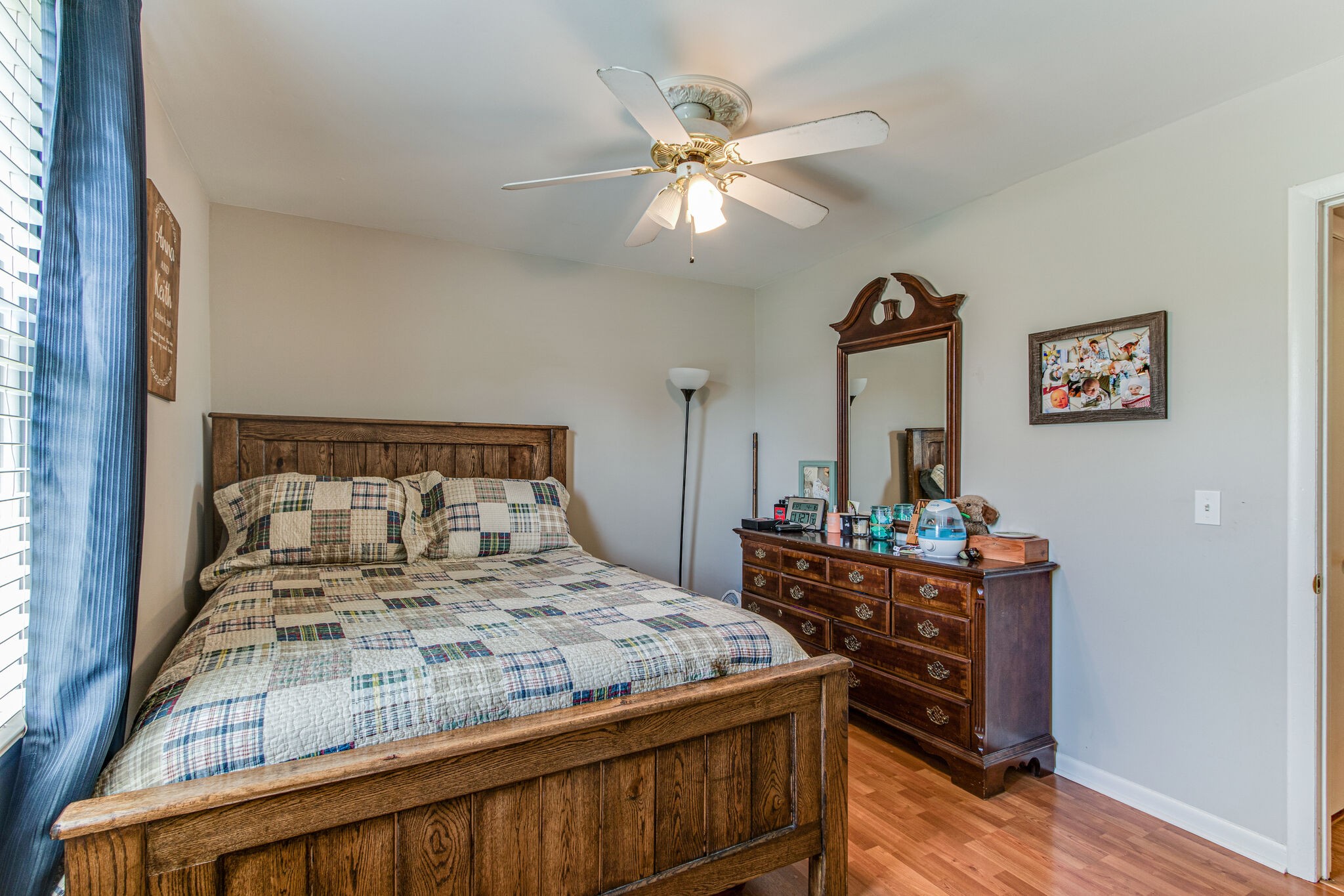 2234 South Ranch Road Murfreesboro, TN 37129 - Photo 23 of 29 a bedroom with a bed and a chandelier