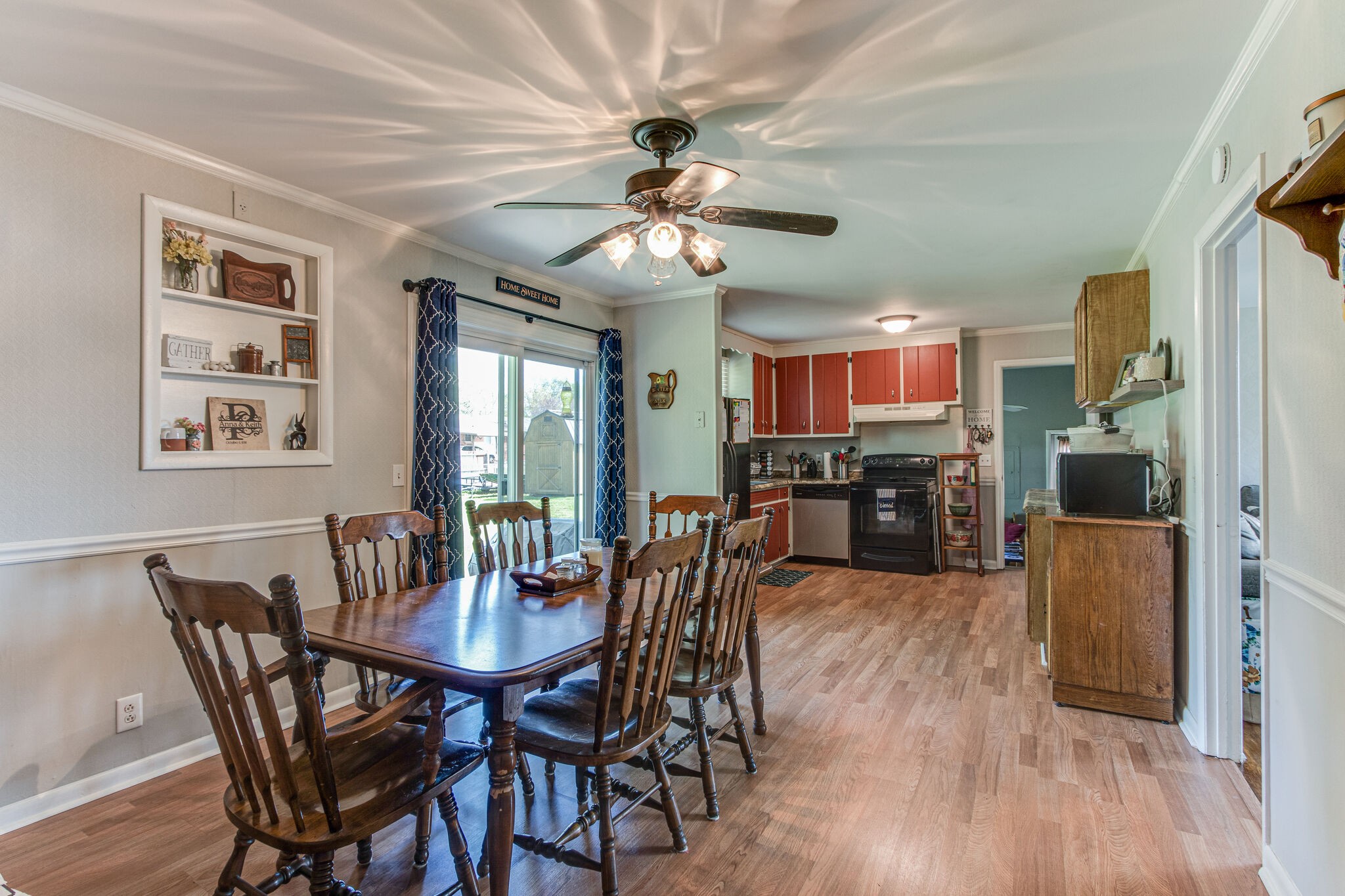 2234 South Ranch Road Murfreesboro, TN 37129 - Photo 8 of 29 a view of a dining room with furniture window and wooden floor