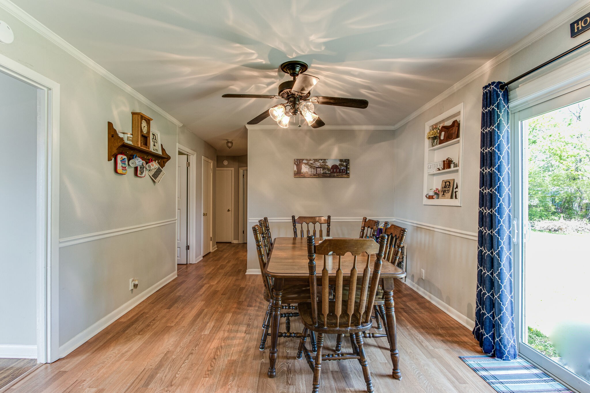 2234 South Ranch Road Murfreesboro, TN 37129 - Photo 9 of 29 a view of a dining room with furniture window and wooden floor