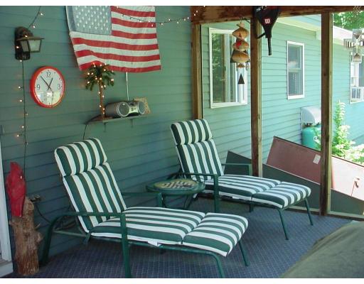 44 Kimball Road Amesbury, MA 01913 - Photo 8 of 28 a view of a chairs and table in a balcony