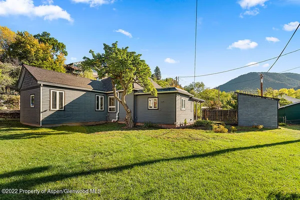 a view of a house with a big yard