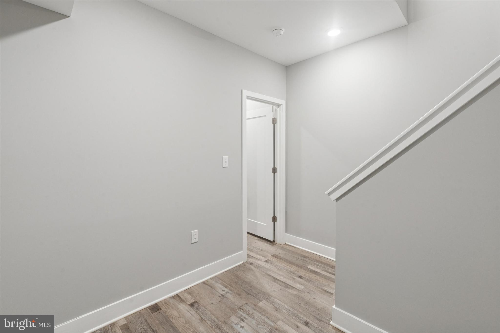 3817 Wallace Street Philadelphia, PA 19104 - Photo 15 of 25 a view of an empty room with wooden floor