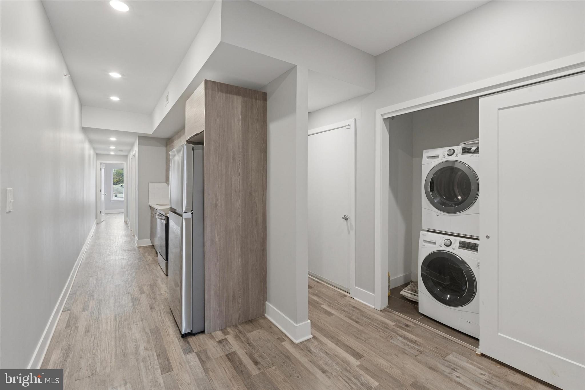 3817 Wallace Street Philadelphia, PA 19104 - Photo 16 of 25 a view of a hallway with washer and dryer