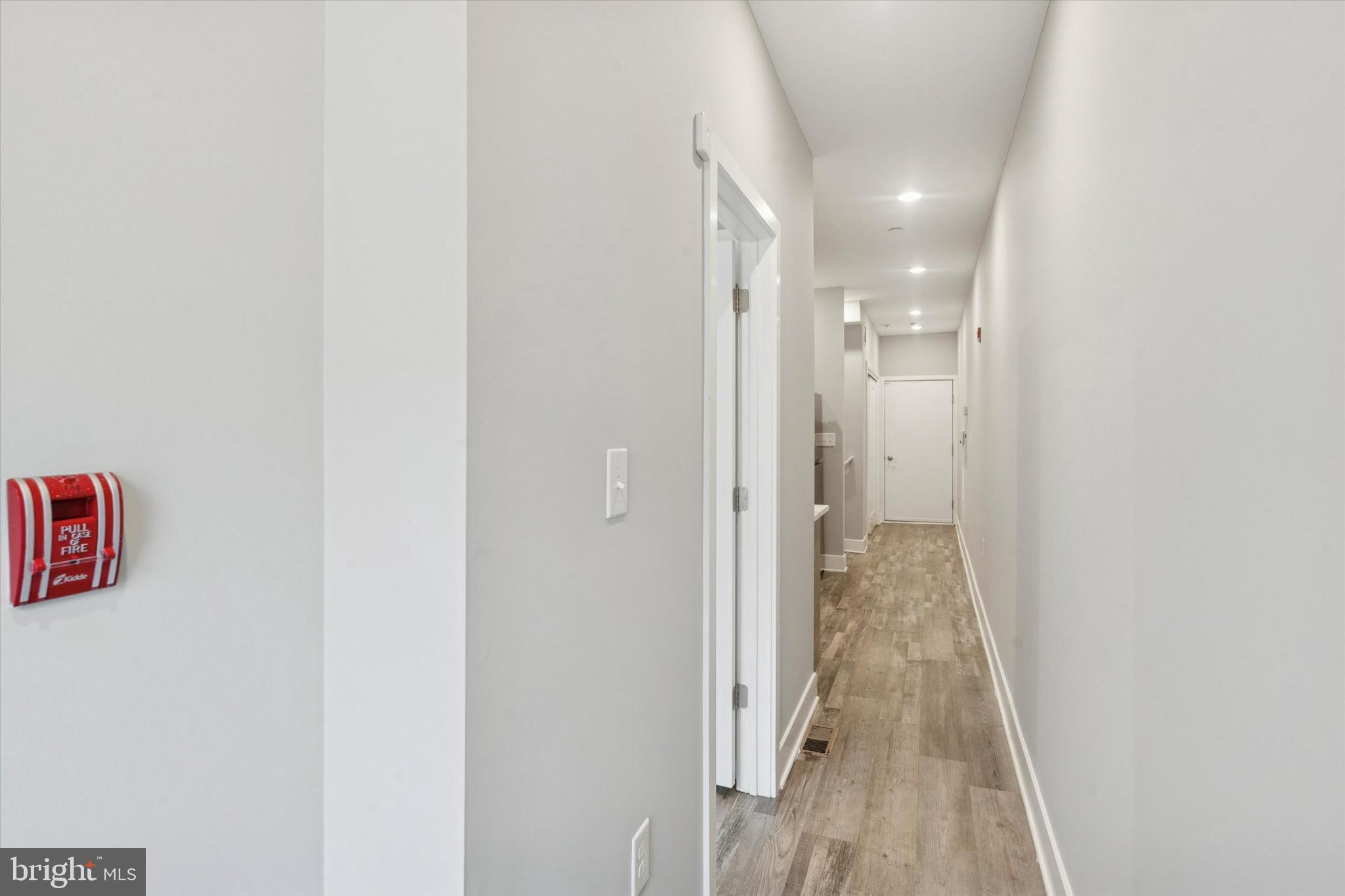 3817 Wallace Street Philadelphia, PA 19104 - Photo 4 of 25 a view of a hallway with wooden floor
