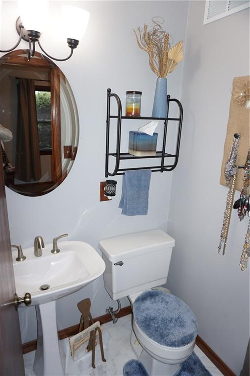 292 Evans Road Zelienople, PA 16063 - Photo 8 of 12 The powder room is located directly off of the master bedroom for your convenience.