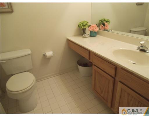 5 Stony Hill Road Jamesburg, NJ 08831 - Photo 15 of 17 a bathroom with a sink and a toilet