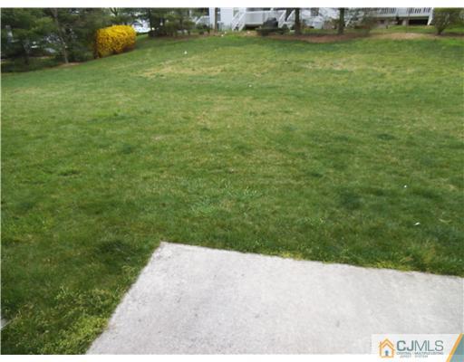5 Stony Hill Road Jamesburg, NJ 08831 - Photo 17 of 17 a view of a golf course with a yard