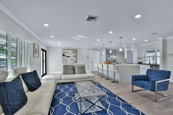 839 Enfield Street Boca Raton, FL 33487 - Photo 18 of 36 a living room with furniture and a large window