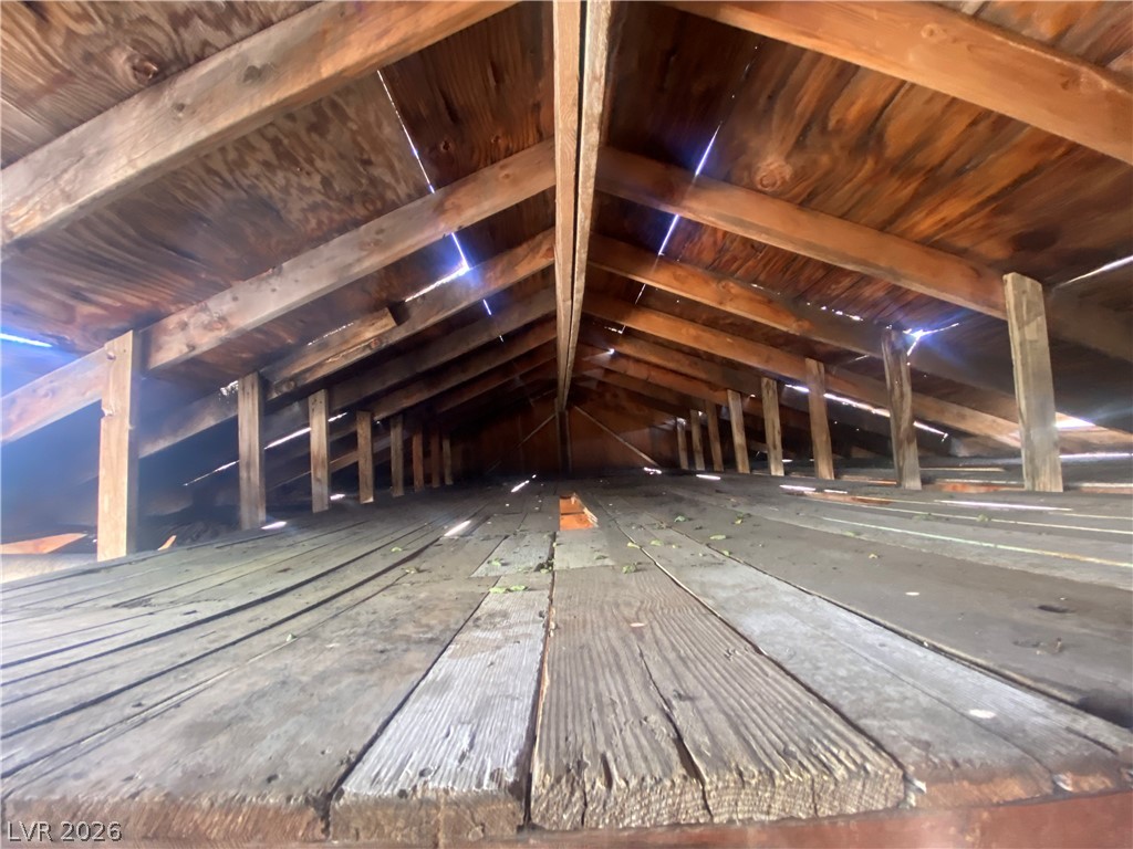 701 3rd Street Gabbs, NV 89409 - Photo 7 of 10 A well-maintained wooden attic structure provides ample storage space.