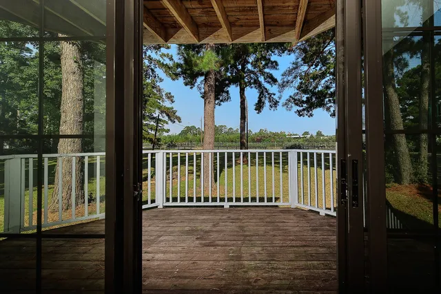 a view of a balcony with a lake view