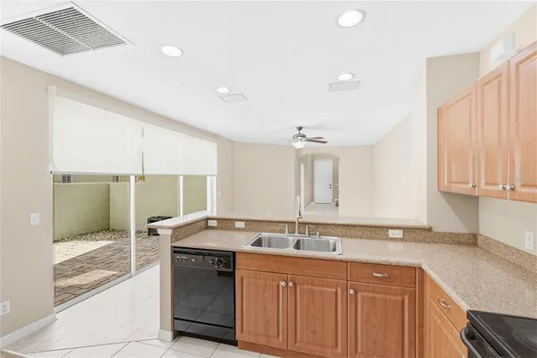 a bathroom with a granite countertop sink mirror and