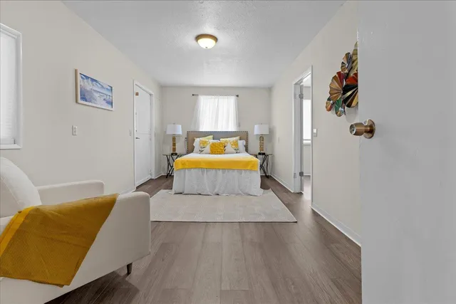 a bed room with a bed and a couch