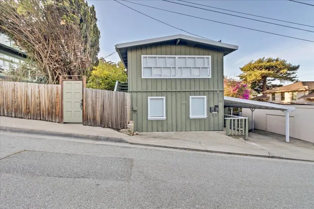 a view of a house with a garage