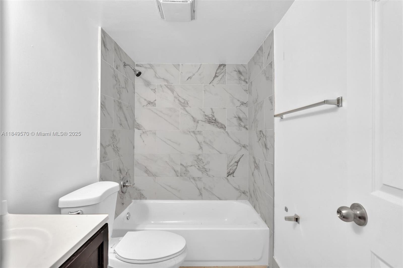 3660 Southwest 60th Avenue, Unit 2 Davie, FL 33314 - Photo 20 of 34 a bathroom with a toilet and a shower