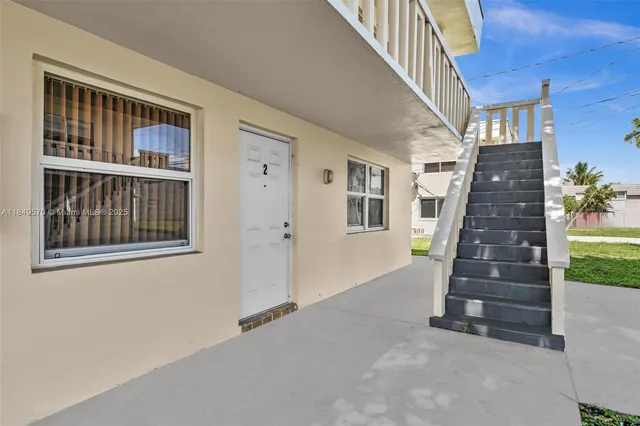 a view of entryway with stairs