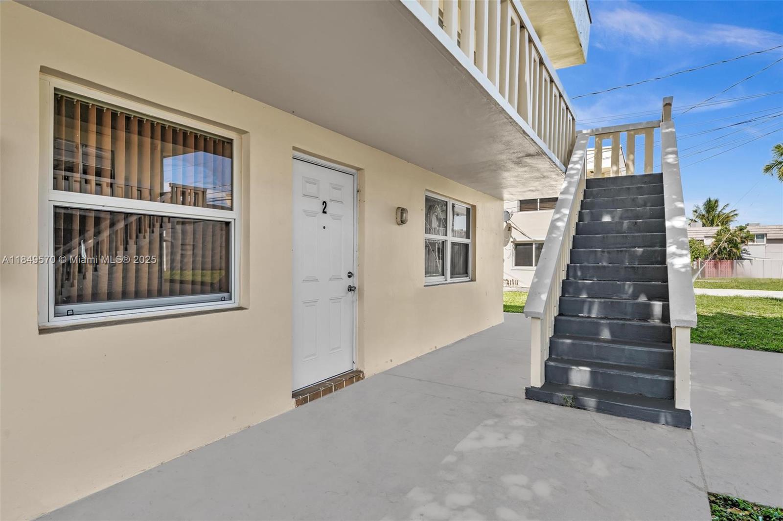 3660 Southwest 60th Avenue, Unit 2 Davie, FL 33314 - Photo 3 of 34 a view of entryway with stairs