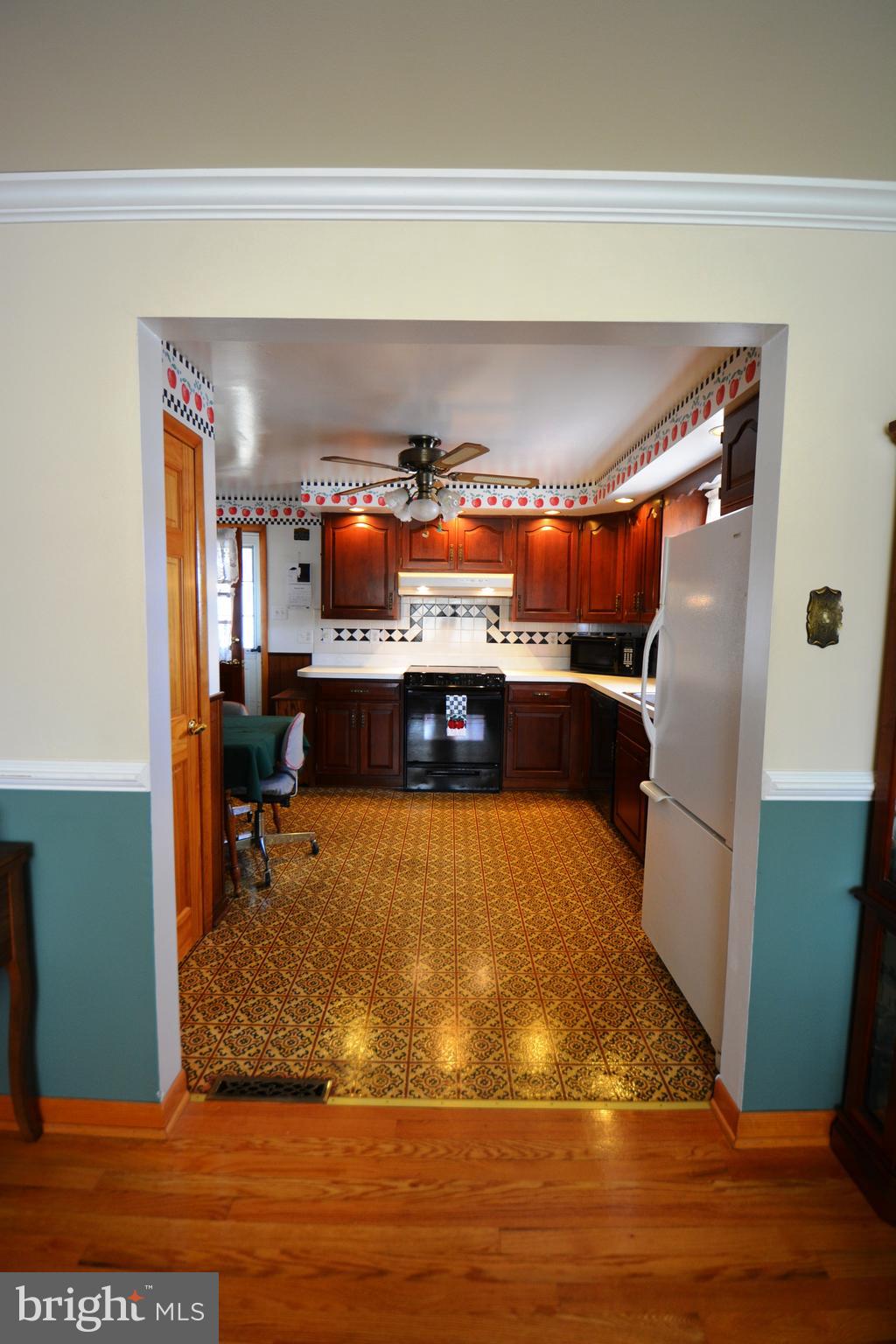 312 Holy Cross Road Baltimore, MD 21225 - Photo 28 of 68 Living room to kitchen