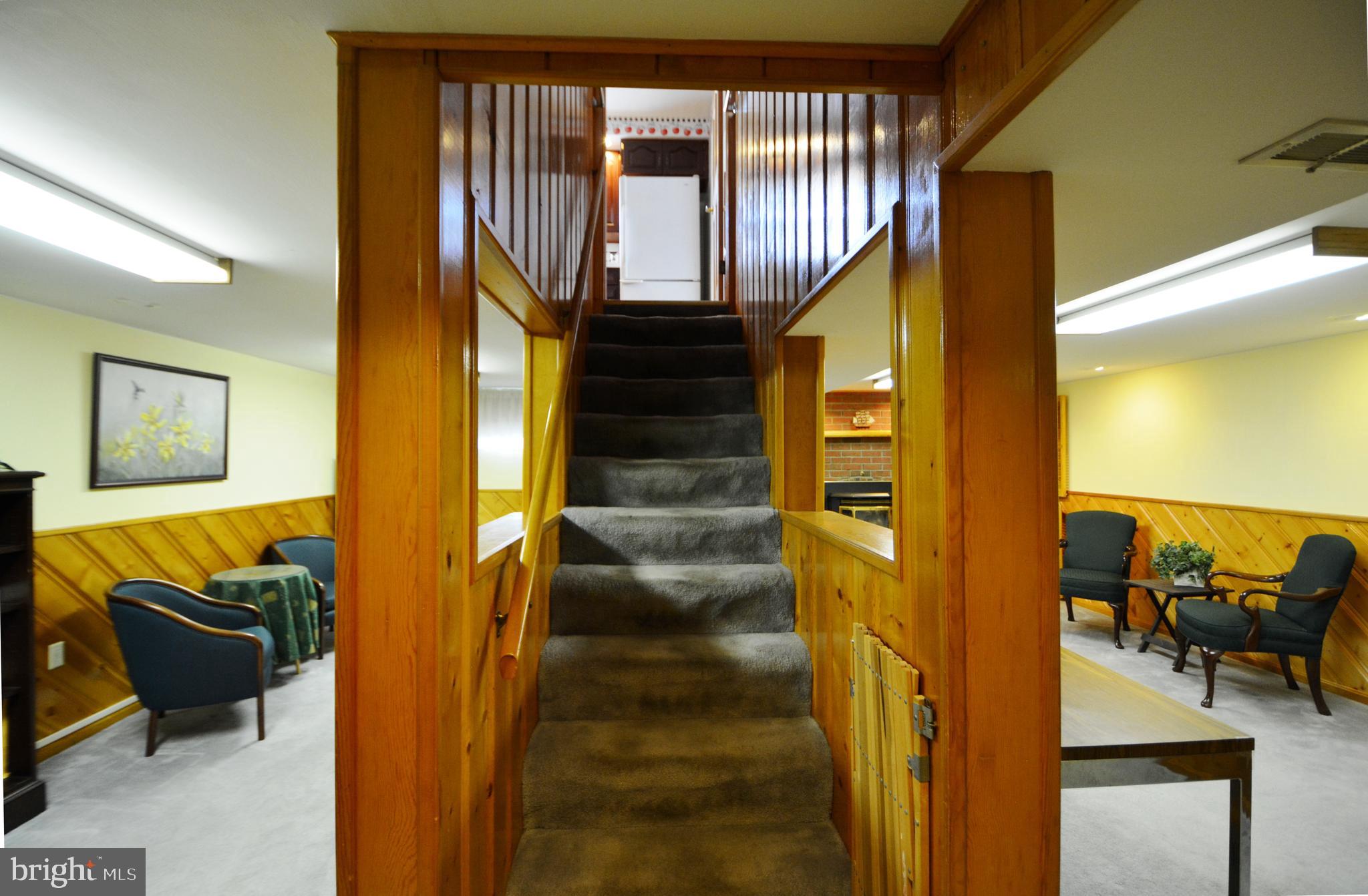 312 Holy Cross Road Baltimore, MD 21225 - Photo 44 of 68 Staircase to basement