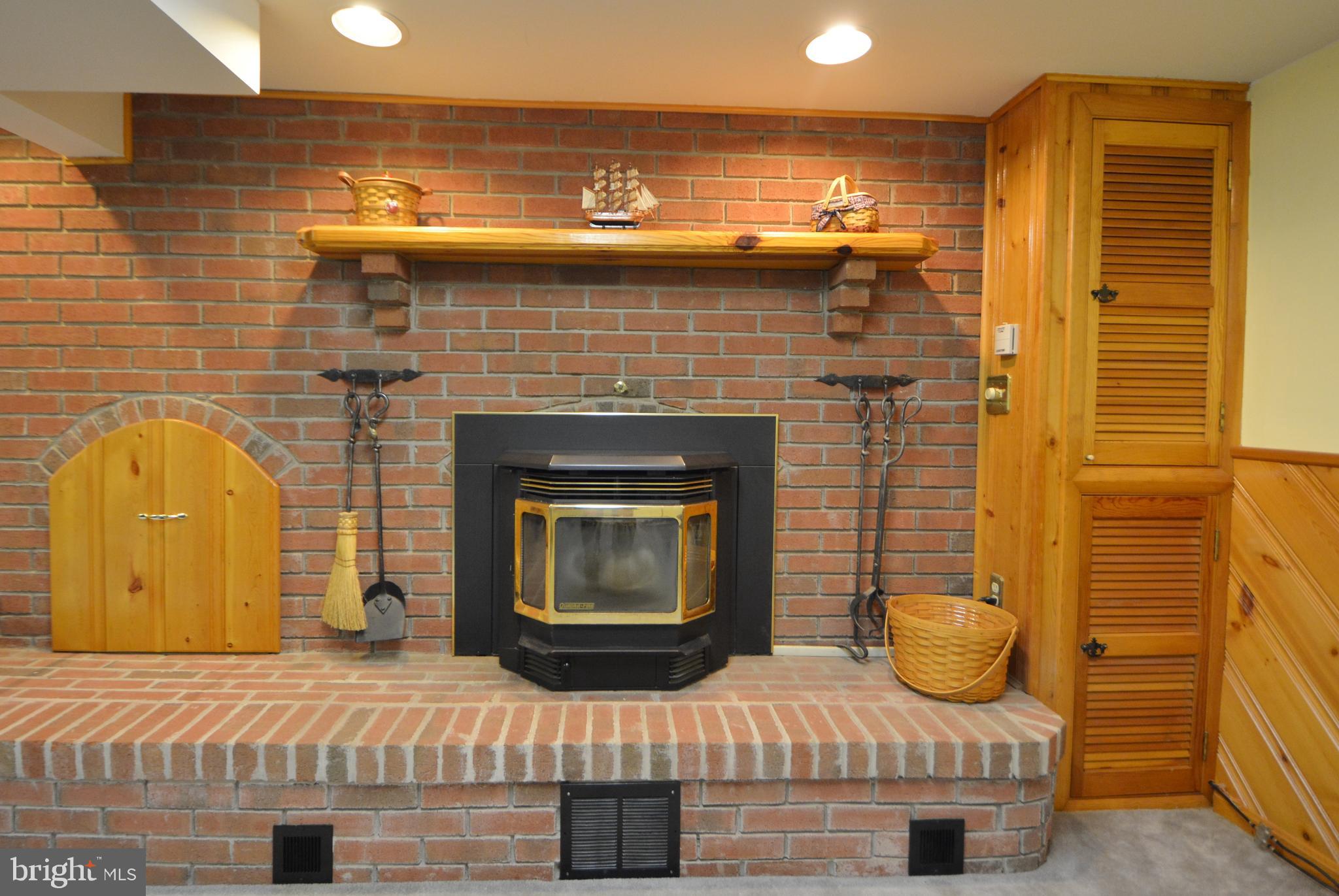 312 Holy Cross Road Baltimore, MD 21225 - Photo 46 of 68 Thermostat control wood pellet stove & custom bin