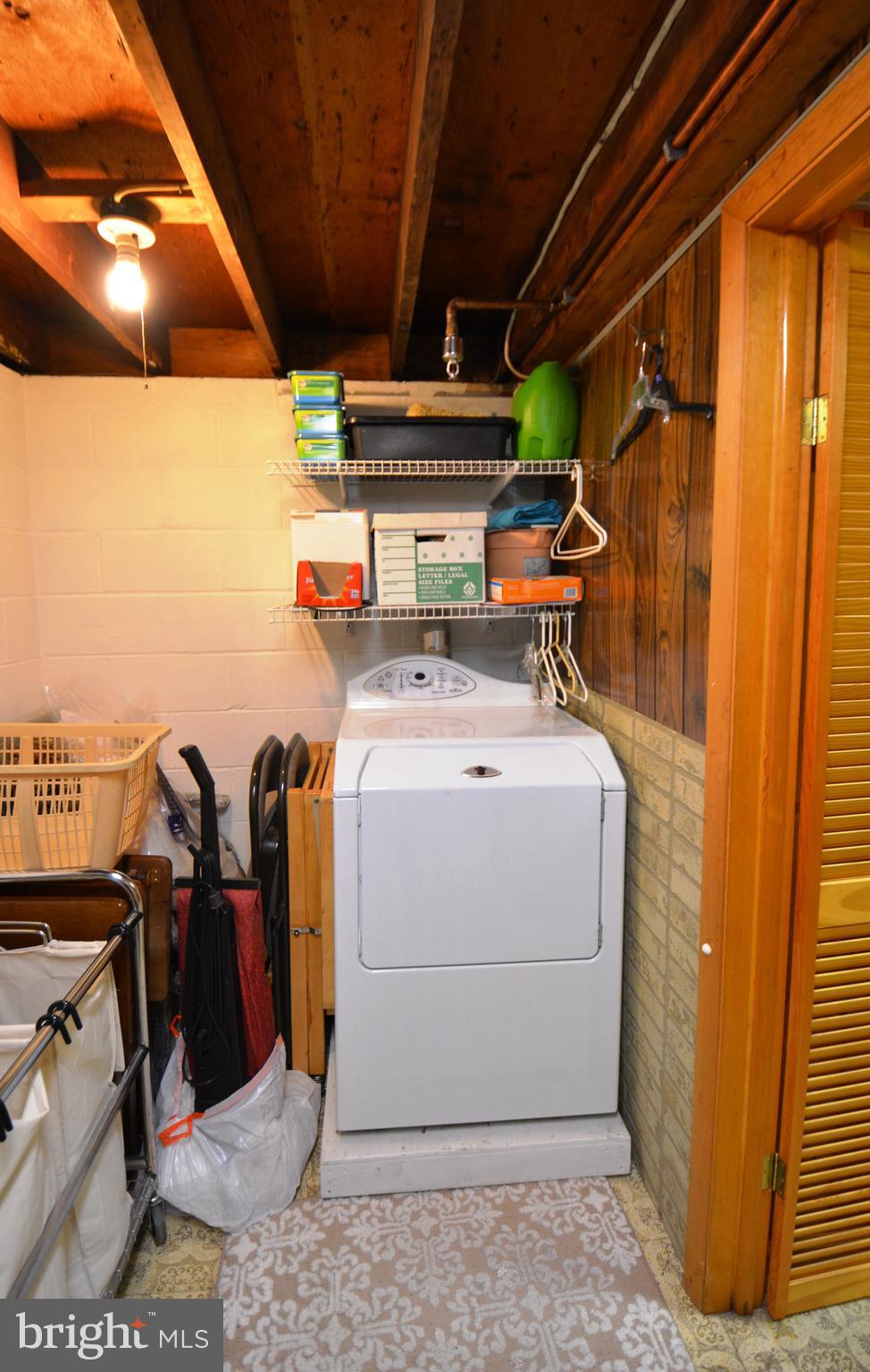 312 Holy Cross Road Baltimore, MD 21225 - Photo 57 of 68 Dryer has sprinkler system on ceiling!
